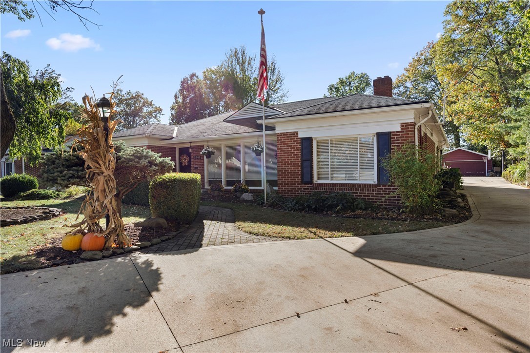 Welcome to this beautiful three-bedroom, well appointed two-bath home, perfect for families or anyone looking for one floor living.  The home offers a flex space that was once a bedroom and became a workout room.  Easily can be transformed into whatever suits your needs. The home boasts two large living areas and plenty of sunlight all around due to all the large windows.  The flow from one living area to the other living area is effortless and is connected by the "heart" of the home, the kitchen.  The kitchen features a skylight which brings in great natural light! The family room features a beautiful gas fireplace for those cozy nights or to add some ambience.  The family room is large enough to be just that plus a dining area for family dinners and entertaining.  Talk about entertaining, take a look at the outdoor space.  Two beautiful brick patios and a complete outdoor kitchen with seating.  There is also a lovely water feature to add a tranquil touch to your outdoor area.  Plenty of yard space for whatever outdoor activities you enjoy.