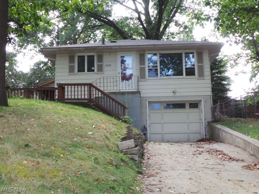 Three bedroom raised ranch located in the heart of Ellet! Hardwood floors throughout, natural woodwork. Eat in kitchen.  large fenced lot w/storage shed.  Side covered patio.  Needs some TLC and this one will be ready to go!  Property sold AS IS.  Equal Housing opportunity.  FHA uninsurable per HUD appraisal.