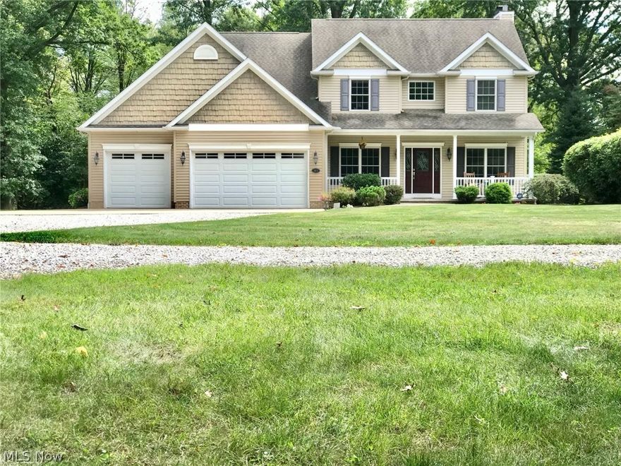 This home has everything you are looking for. Beautiful Custom built 4 bedroom, 3.5 bath Colonial on a 1.6 acre private wooded lot in Green School District. This home is perfect for entertaining, both inside and out! Large welcoming front porch enters into two story foyer with natural hardwood floors. Kitchen features cherry cabinets, granite countertops, stainless steel appliances, newer double ovens, plenty of counterspace and tons of natural light! Kitchen opens to both the sunroom with French doors and the great room with wood burning fireplace. Dining room features recessed ceiling with radiant lighting. Also on first floor is a den with French doors and built in desk, half bath with pedestal sink, and a mud room off the garage. Second floor features four huge bedrooms, laundry room, main bathroom with double sink and tiled shower/bath. The owners suite has a gas fireplace, bathroom featuring cherry vanity, Jacuzzi tub, large glass two person shower, and walk in closet. Home featu