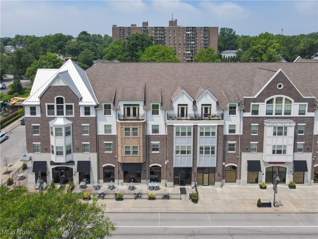 Welcome to this beautifully updated and highly sought-after 2-bedroom, 2-bathroom condo located in the heart of Downtown Cuyahoga Falls. This spacious and modern unit combines comfort, style, and convenience all in one perfect package. Step inside to find a thoughtfully designed layout featuring a private primary suite complete with a large walk-in closet and a renovated ensuite bathroom boasting a new quartz countertop, sink, and faucet. The guest bathroom has also been completely refreshed with a new counters, sink, and faucet, creating a clean, contemporary feel for guests and residents alike. The kitchen is a showstopper with updated quartz countertops, custom cabinetry, stylish backsplash, under-cabinet lighting, and a new sink and faucet—perfect for both everyday cooking and entertaining. The open-concept living area is enhanced with updated lighting fixtures throughout and a sleek, modern wall-mounted entertainment cabinet that ties the space together. The great room lends to a nice balcony. Additional features include in-suite laundry with washer and dryer, fresh paint throughout the home, and a smart, efficient layout ideal for low-maintenance living. All this just steps away from local shops, dining, parks, and the riverfront—making it the perfect home for anyone looking to enjoy the best of what Cuyahoga Falls has to offer. Includes one detached garage space. Don’t miss your chance to own this turn-key gem in a prime location!