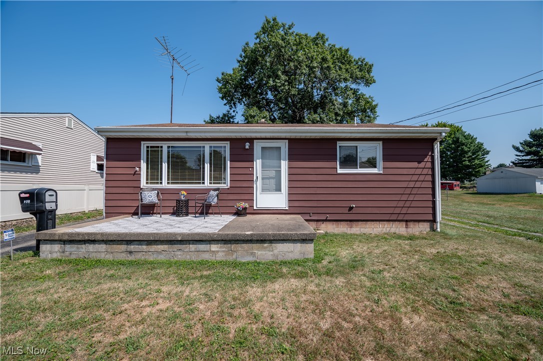 Don't let this beauty pass you by, it has so much to offer and is larger than it looks. As you enter from the quaint front porch you will find beautiful original hardwood floors with a large front window that brings plenty of natural light into the main living space. The eat in kitchen is just behind the living room and has an abundance of cooking space and appliances are included. Heading to the back of the home is a 12 x 9 laundry/mudroom that can be converted to an office or left as is (additional laundry hook up in the basement). The three bedrooms showcase the same beautiful wood floors while two of the bedrooms have double spaces to allow for dressers, vanities, cribs, office space, dressing room or whatever your needs are. The full bath has been nicely updated. The extensive basement offers potential for a great rec room. The outside features 3 lots! Each lot is 50 x 150 so this home provides 150' frontage and is 150' deep. There is also a large (24 x 24) two car garage with an adjacent carport and all are accessible from the circular driveway. The back porch provides additional outdoor space for cooking out or just relaxing on a nice sunny day. Let's not forget about the pets with an invisible dog fence to keep the pups in the yard. The potential is endless! Recent updates include a new furnace in A/C and newer vinyl windows (approximately 6 years old), newer electric box inside and out, and a gas stove line for a stove for those bakers who need another over. Don't miss this opportunity, you won't find this much at this price again.