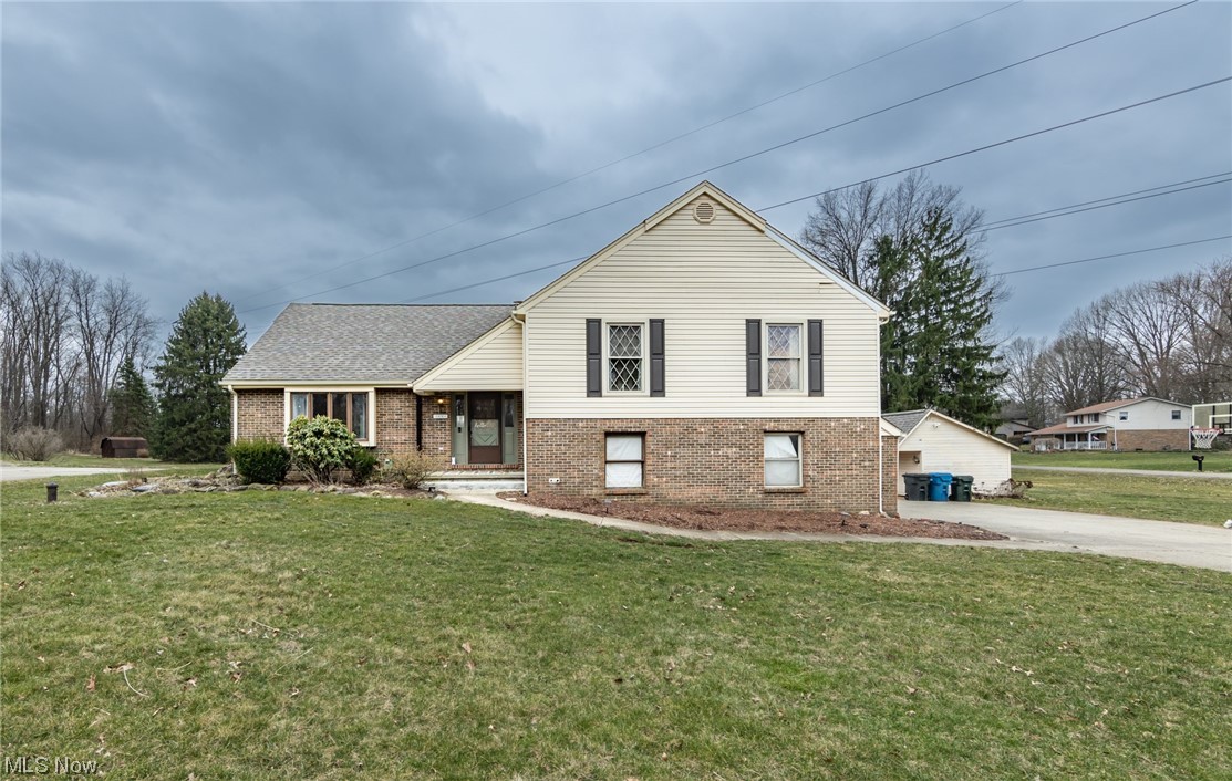 $20,000 PRICE REDUCTION! A remarkable 4 level split on approximately 3/4 of an acre. This lovely home features 4 bedrooms, ALL UP, and 2.5 baths. A master suite has an updated bath, and the guest/main bath is updated as well. The open kitchen has a center island, and full dining area as well. The large living room is open to the over sized foyer. The 25x14 Family room has a fireplace, 1/2 bath, and leads to a 25x12 Sun Room/Four Season Room. A fenced back yard has a huge deck, an outbuilding, and a brick patio. There is a partially finished lower level and an attached 2 car garage. This home has a newer roof and gutters ('20), siding ('20), hvac, softener ('22), and more.