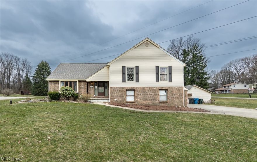 $20,000 PRICE REDUCTION!  A remarkable 4 level split on approximately 3/4 of an acre.  This lovely home features 4 bedrooms, ALL UP, and 2.5 baths.  A master suite has an updated bath, and the guest/main bath is updated as well.  The open kitchen has a center island, and full dining area as well.  The large living room is open to the over sized foyer.  The 25x14 Family room has a fireplace, 1/2 bath, and leads to a 25x12 Sun Room/Four Season Room.  A fenced back yard has a huge deck, an outbuilding, and a brick patio.  There is a partially finished lower level and an attached 2 car garage. This home has a newer roof and gutters ('20), siding ('20), hvac, softener ('22), and more.