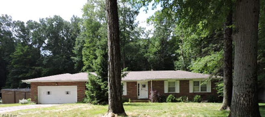 Spacious Boardman Brick Ranch. Rear family room with attached screened in patio. Partially finished basement, master suite with private bath and dine in kitchen. Attached 2 car garage plus spacious .45 ac wooded lot with shed in rear yard. All sales are subject to FC deed and clear title.