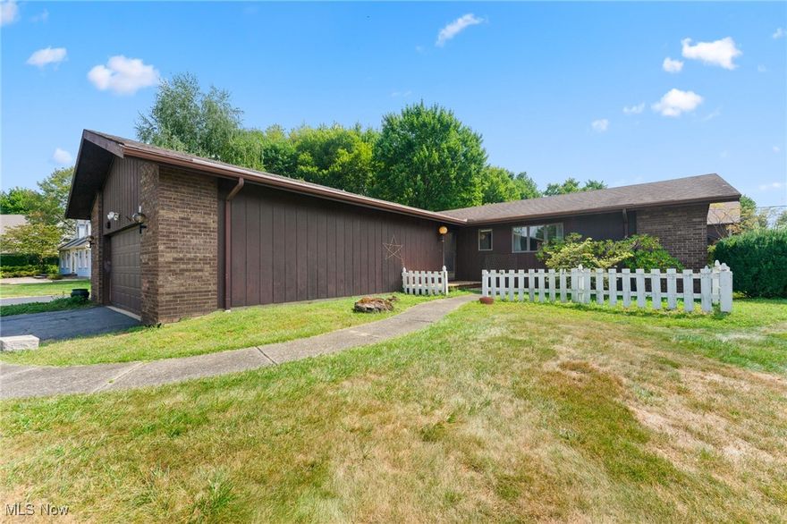 Contemporary Retro Ranch, Great floor plan with open Kitchen Eating area and Great Room.  The Fireplace is a cozy addition to the Great Room That has lots of Room to entertain and or just lounge.  3 Bedrooms and 2 Full Baths.  2 car side entry garage has extra storage and a garage door opener.  The new hot water tank new in 2020,  Anderson Casement widows throughout, Roof newer,
Cedar on the exterior looks like new.  Sliding glass doors to the Sun Room are a welcome retreat after a busy day or in the morning to start your day.  Two car side entry garage + room to have more storage or workshop.  Vaulted ceiling in the Living Room gives this room the wow factor.  Needs a little help to bring up to the