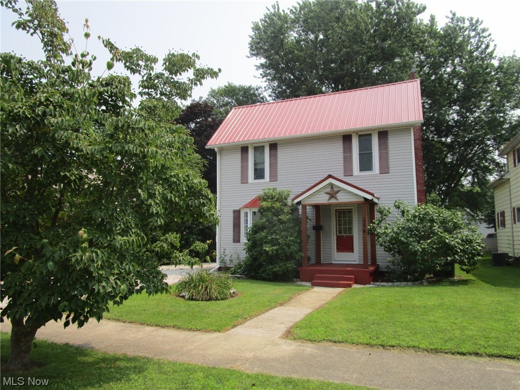 Missed your chance?We are back on the market - through no fault of the house!Quite possibly THE cutest house on the Street! Minutes from the Lake, fine dining, medical facilities, shopping & more, this updated colonial won't last long!From the mature nicely done landscaping to the fenced back yard & the lovely old shade trees, you'll rush home from work to spend some relaxing time outside here!Updates w/i the last several years include a 2016 water heater, 2017 storage shed, 2018 metal roof, 2020 wood fencing & 2021 furnace! Really nothing left to do here except move in! Shady fenced back yard offers privacy & a wonderfully safe place for children & /or pets, along with an additional shed for extra storage.Large deck has plenty of room for your grill & picnic table, so let the outdoor dining begin! Kitchen is crisp and clean, w/ plenty of newer countertop space and flows directly into the large, sunny dining room. There's a convenient first floor home office/den/game room? just off the