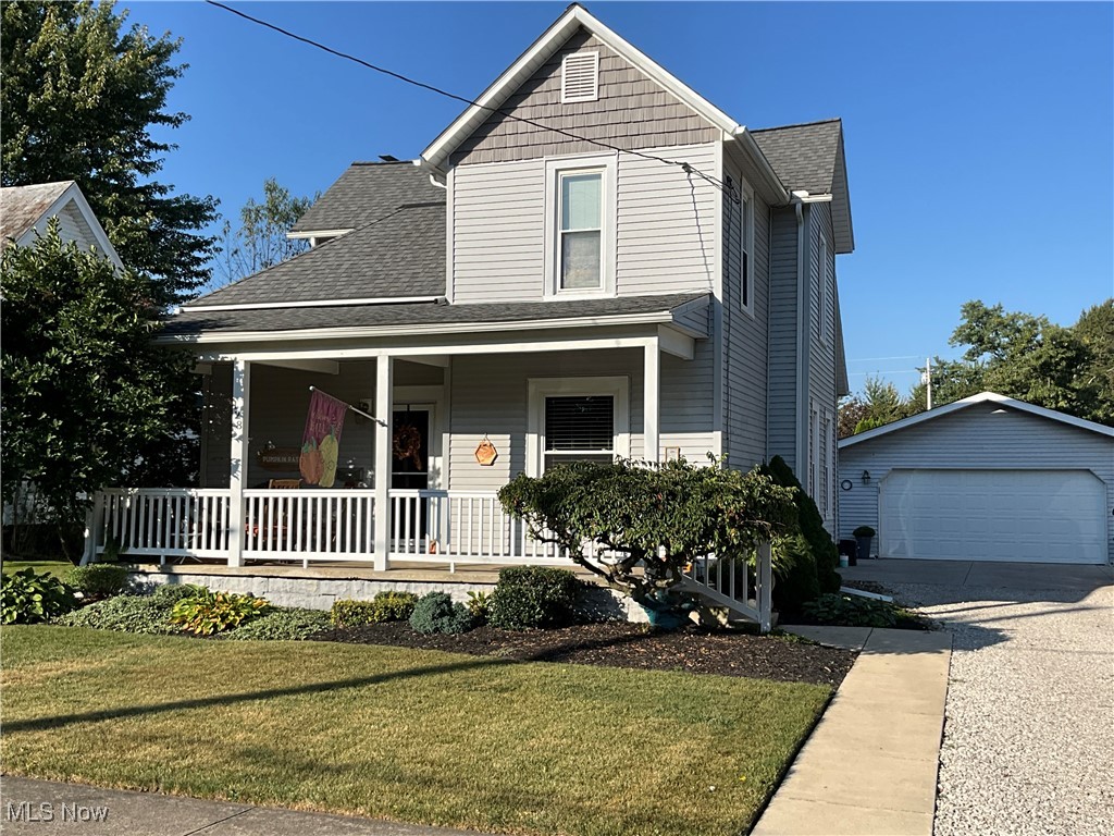 Very well kept, beautifully decorated 4 BR, 1 bath 2 story home within walking distance of the park & downtown. Many updates include: furnace w/central air, basement waterproofing, roof, new flooring & woodwork, windows & plumbing. Rebuilt oversized detached 2 car garage includes 1/2 bath. Nice covered trex deck in privacy fenced backyard, concrete patio, storage shed & covered front porch.