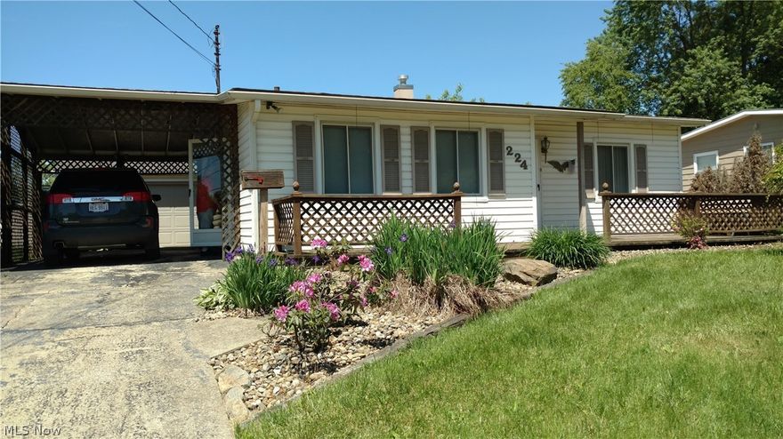 2 bedroom slab ranch with 1.5 detached garage and carport. Small deck off 1 bedroom. Stackable washer and dryer stay. Great for downsizing or starter home.
Furnace, hot water tank,roof, and air conditioning done in last 10 years.