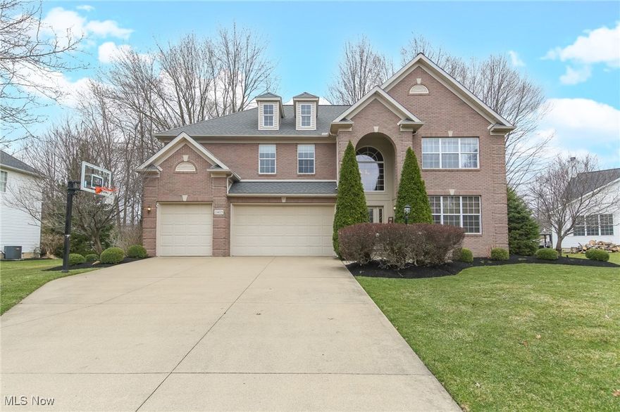 Set in a prime location in the coveted Stonebridge creek, this stately colonial beckons you. The 2 story foyer welcomes you as you notice the natural light beaming into the home. A king James build, this home offers over 3500 square feet of high quality living with architectural features thru out that stand out from the rest. The main level boasts an open floor plan with a seamless flow, while providing a living room and dining room to the right of the foyer. The spacious 2 story great room is the perfect place to gather featuring gorgeous windows and fireplace. This space is open to the eat-in kitchen. A chefs delight, the kitchen stuns with abundant cabinetry, corian countertops, SS appliances, and large island with breakfast bar and window clad eat-in nook. Wood look laminate floors guide you thru the main level which also grants a 1st floor bedroom, full bath, and mudroom. Up the open staircase, you will find the gorgeous and sizable master suite with his and hers walk in closet and glamour bathroom with 2 vanities, soaking tub with jets, shower, and private commode. Down the cat walk are 3 more large bedrooms and a full bath. The full footprint lower level is ready for your touch, plumbed for another bathroom, high ceilings, and offers endless opportunities. The professionally manicured landscape offers outdoor enjoyment with the sizable yard, and a stamped concrete patio with perfectly edged beds. The mature trees and shrubs provide privacy. Easy to maintain with sprinkler system.  Rest assured with new hvac, h20 tanks, roof, and mechanicals. 3 car garage with brand new door. Close to all things Avon. Award winning avon schools score top ranks year after year. Stonebridge creek amenities include community pool, playground, and park. This stunning home, in a prime location won’t last long. Schedule your showing today.