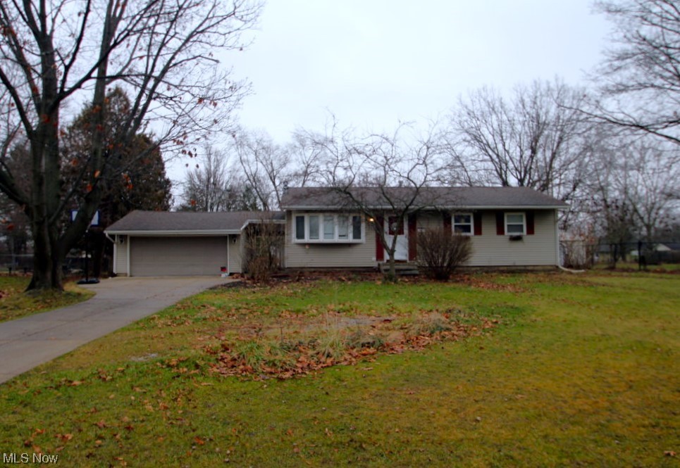 Welcome Home to this 3 Bedroom 1 Bath ranch style home. Upon entry, you're welcomed into a spacious living room. Outside, enjoy the serene backyard with plenty of room for gardening, relaxation, and outdoor activities. There is a roomy 2 car detached garage with a covered breezeway. The basement is plumbed for a full bathroom which is partially completed. Transferable waterproofing was completed in October 2022.