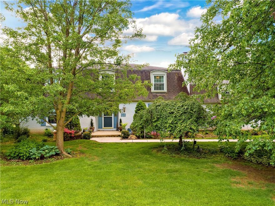 This two-story colonial is so charming! The large lot is very private. There is a huge covered patio off the kitchen, perfect for entertaining. The kitchen has painted cabinets with a center island with granite. The family room is super cozy with a fireplace. Large living room and dining room. There are 4 bedrooms upstairs and all baths have been remodeled. Master-suite is very nice and large... beautiful home!