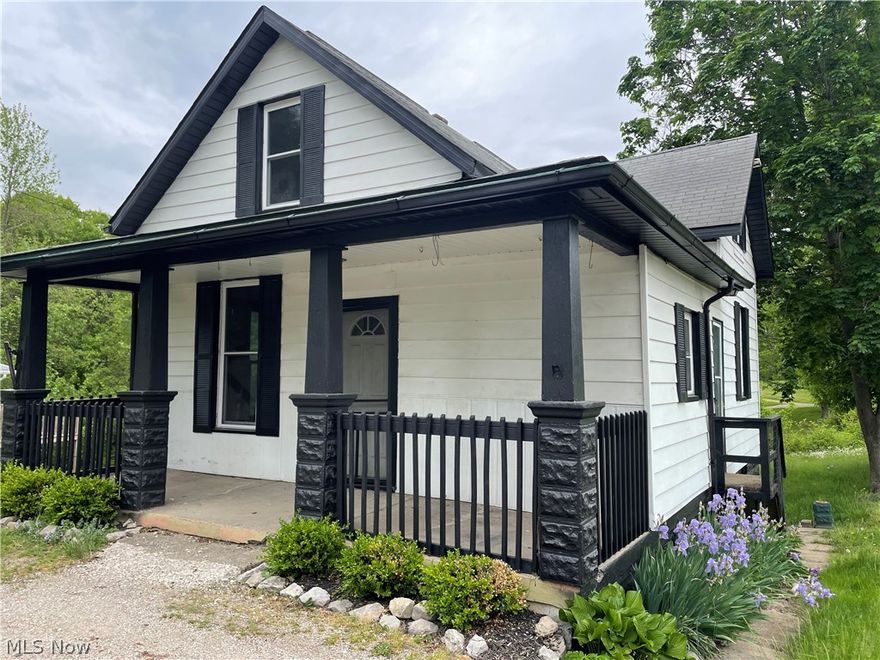 Updated 1.5 story on east side with easy access to I-70! Home features 2 bedrooms with nice kitchen including appliances bar. First floor bath, master bedroom with walk-in closet, , and a second bedroom, enjoy outdoor spaces with a covered front porch, wrap around deck and covered patio outback, overlooking countryside.