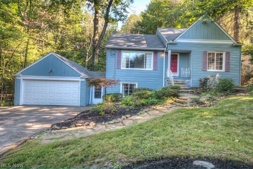 Beautiful home! Beautiful Lot! This custom built cap cod home is conveniently located in the heart of Parma.  It is truly a one of a kind property.  It offers 4 bedrooms, 2.5 baths, 1690 square feet of living space, and a 2 car attached garage.   The home features a 2 story family room with a wall of windows overlooking the wooded back yard.   This unique family room is the focal point of this home! Off of the family room is access to the multi-level deck and patio where you will enjoy the park like setting this lot has to offer. There is an eat-in kitchen with oak cabinets, ceramic tile flooring and it comes with all the appliances.  In addition there is a formal living room, dining room and a recreation room with wood burning fireplace.  Recent updates include newer carpeting in the family room, living room and dining room.