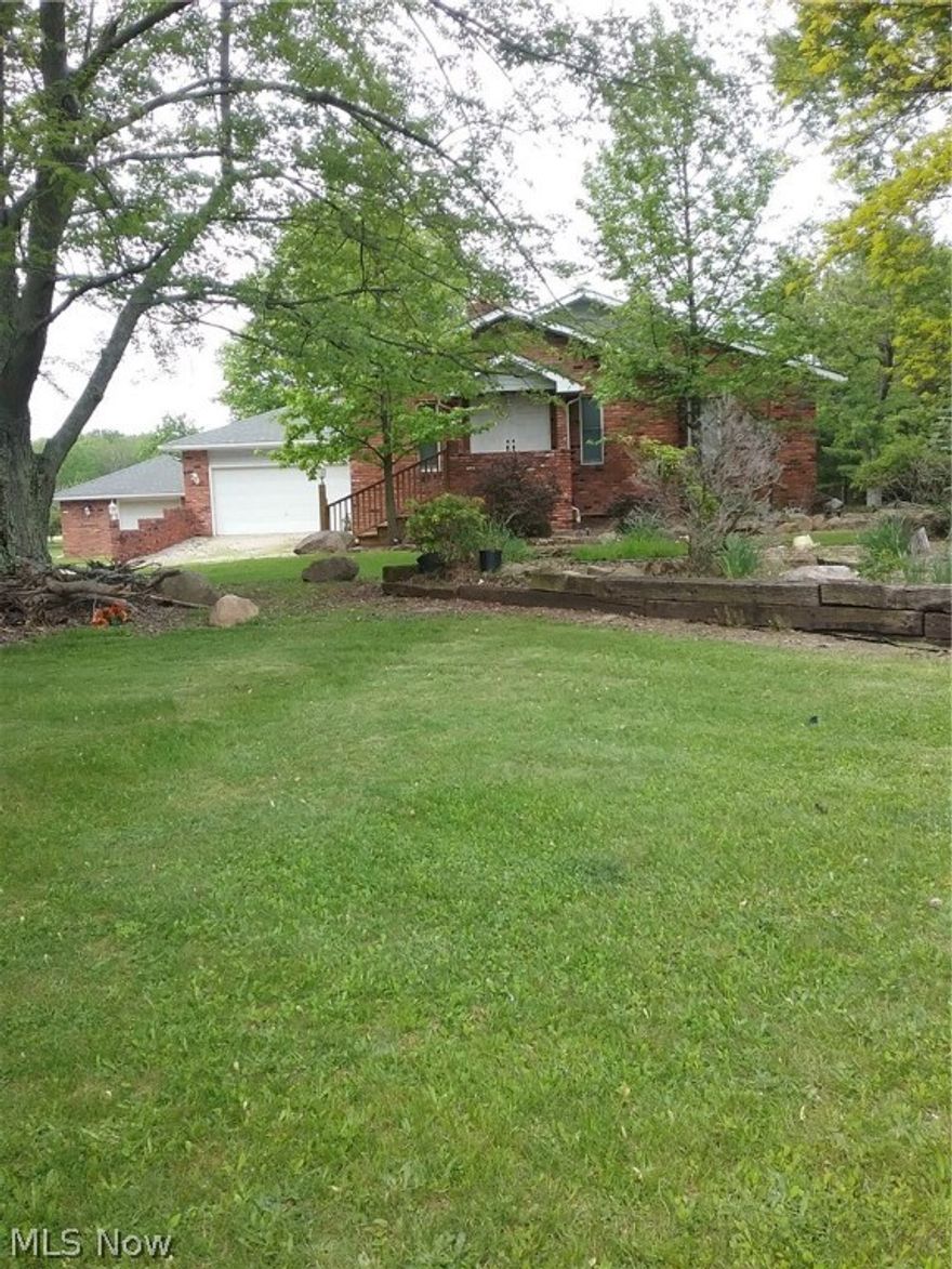 Ranch Retiring Builder/ Contractor Sizing Down. Great views, open , oversized main gathering rooms including living room, great room and family /media room with multiple fireplaces.  Formal dining room, new kitchen, mast. bedroom with  on-suite. First floor laundry room.  Closets & storage throughout 2300 sq ft. Basement with fireplace, walk-out and rough in bath. Wrap around covered upper deck looks onto  3.35 acres of park like lot. Two double  garages and two utility garage/workshops. This custom home was expanded almost doubling its size and updated throughout " Down to the Studs"  4 areas divided in Basement for 4th bedroom/ bath & office, walk-out & rec room & theatre room/fireplace.