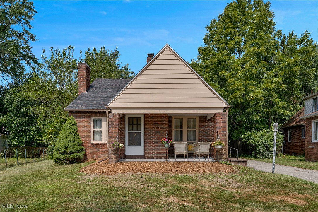 Cozy bungalow trimmed in original woodwork and hardwood floors. New roof in 2025. Updated bathroom and kitchen. New kitchen appliances convey with the sale. Covered front patio perfect for quiet mornings with coffee. Family room fireplace makes for a picture perfect night in. Boardman schools.