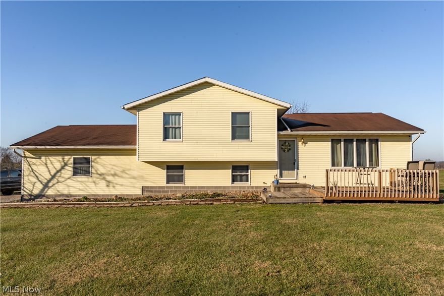 This amazing property has so many possibilities!!!  A four level split with plenty of space for entertainment and gatherings.  Master Bedroom with private bath and large closet.  Two car attached garage that leads into a large laundry are with storage plus a basement for extra storage.  A homeowners dream with this detached 32x72 builder that is heated and has central air conditioning!!!  This building is set up for many uses with over head doors and office or display room.  This building will not disappoint any buyer looking for a building!