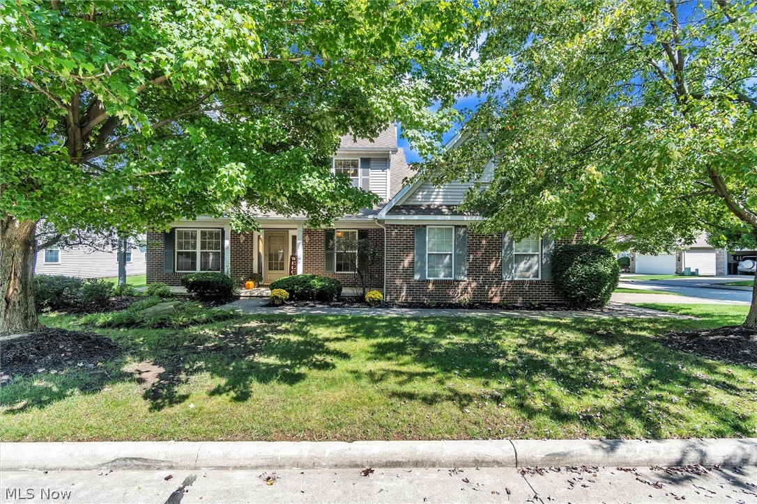Welcome home to this Stunning 3/4 bedroom Colonial located in desirable Village Courts of Middleburg Hts - Meticulously maintained by Original Owner - One of larger style models set on corner lot of private cul-de-sac with side entry garage/driveway -Abundant curb appeal with landscaped beds & welcoming front porch -Enter into spacious 2-story Foyer with large window above -adjacent Formal Living Room (current owner was easily able to convert into a 1st floor bedroom when necessary) opens to formal Dinning Room -Lovely Eat-In Kitchen has abundant natural light, ample cabinet/counter space, island, desk area & sliding patio doors -Beautiful double sided gas fireplace is shared between Kitchen & Family room which includes hardwood floors & vaulted peaked ceiling- Laundry/Mudroom includes maintenance closet with HVAC & HWT -convenient full bath completes first floor -Upstairs has a private Master en-suite with wood floors, vaulted ceiling, generous walk-in closet + bath with double sinks,