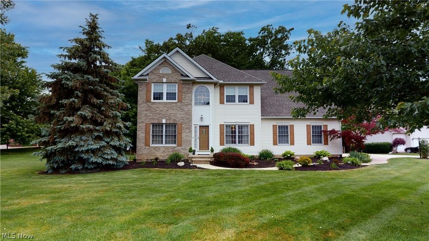 Great Colonial in Stone Hollow Development, Concord Twp with Mentor Schools! Large Corner lot on a Cul De Sac Street with wooded back yard. Spend hours enjoying this space on the Private Deck.  You are greeted with a 2 Story Foyer with HDWD Floor that welcomes you home. Gorgeous 42" Cherry Cabinets line the Kitchen with Newer SS Appliances, lots of counter space, Ceramic floor and Big Eating Area surrounded by Windows. 2 Story Great Room is accented by Gas Fireplace and Natural Light coming in through the many windows with a 2nd Floor Loft Area overlooking the open space. 1st Floor Laundry Room, Update Half Bath with Granite Counter Top, Dining Room and additional Living Room which can made a perfect home Office. Master suite has Laminate flooring, Spacious Walk in Closet, and private Full Bathroom with Soak Tub, Stall Shower and Sky Light. Full, Finished Basement adds so much additional space. It has a Large Family Room area, 2 Bedrooms or areas to craft, work out, or work from home p