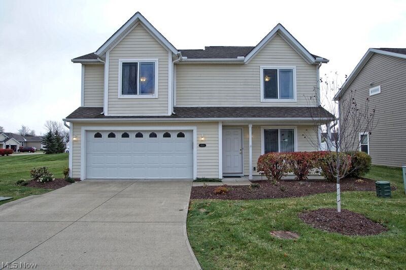 A gorgeous and immaculate 3 Bed, 2.5 Bath colonial located in a desirable neighborhood. This home greets you with a tranquil color palette and features a stunning open concept first floor with upgraded flooring and many updates throughout. A lovely living room with newer hard wood floors and wainscoating is perfect for additional sitting area, dining room, office or a den. A large eat-in kitchen opens to the family room with architectural detail along with a gas fireplace. Two spacious bedrooms with abundant closet space and storage along with a owners suite with bath and huge walk-in closet complete the second floor. Updates include; hardwood flooring in living room, newer laminate flooring in family room and bedrooms, newer carpeting, newer backsplash in kitchen, newer paint and much more! This is a spectacular lot located on the end with patio that faces greenspace. Maintenance free living with a very low HOA fee - covers front landscaping, lawn care, garbage pickup, and snow rem