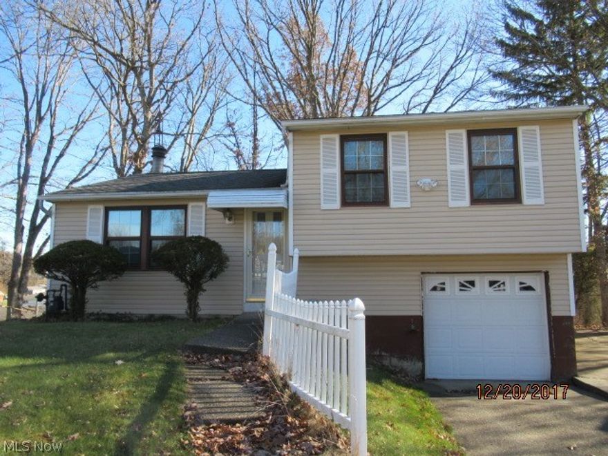 Don't just drive by this charming three bedroom split within walking distance to the football stadium.  Home appears to have a newer roof, siding and mechanics.  Sold as-is and buyer/buyers agent to verify all information.