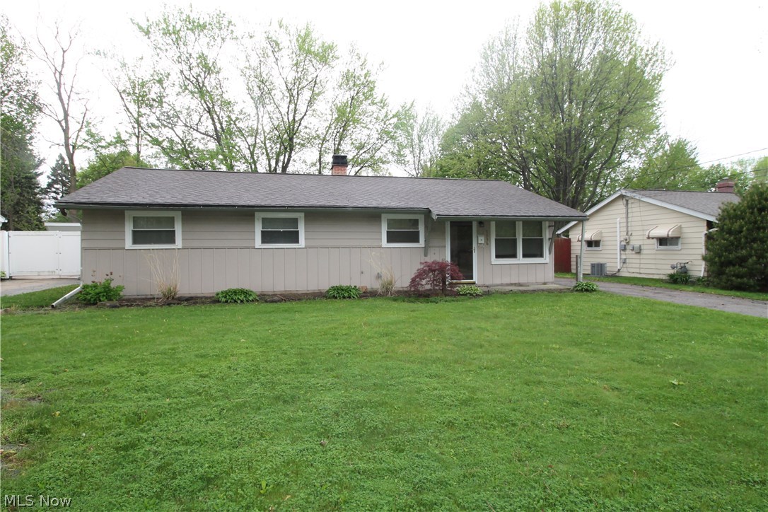 Only 0.7 miles from beautiful Lake Erie and Overlook Beach Park, this warm and inviting ranch is located on a quiet street in a great neighborhood. Beautifully maintained and updated featuring an open floor concept from your living room to your spacious, bright eat in kitchen with an abundance of cabinets for storage and a built in pantry with a lovely tile back splash. All newer appliances (2-17) stay including washer and dryer. Substantial living space is enhanced with lots of natural lighting with newer windows with blinds throughout. Living space also provides a TV mount for your large flat screen TV. One full bath in addition to a 1/2 bath in Master bedroom. Sliding glass doors off kitchen onto large patio, overlooking a partially-fenced large back yard, with updated electric and flood lights to enhance the beauty of a newly landscaped backyard. Home offers a two car garage. Updated lighting throughout the home, ceiling fans, newer carpet, flooring, and bathrooms just to name