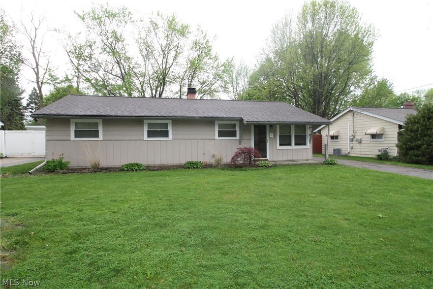 Only 0.7 miles from beautiful Lake Erie and Overlook Beach Park, this warm and inviting ranch is located on a quiet street in a great neighborhood.  Beautifully maintained and updated featuring an open floor concept from your living room to your spacious, bright eat in kitchen with an abundance of cabinets for storage and a built in pantry with a lovely tile back splash. All newer appliances (2-17) stay including washer and dryer.  Substantial living space is enhanced with lots of natural lighting with newer windows with blinds throughout.  Living space also provides a TV mount for your large flat screen TV.  One full bath in addition to a 1/2 bath in Master bedroom. Sliding glass doors off kitchen onto large patio, overlooking a partially-fenced large back yard, with updated electric and flood lights to enhance the beauty of a newly landscaped backyard. Home offers a two car garage. Updated lighting throughout the home, ceiling fans, newer carpet, flooring, and bathrooms just to name