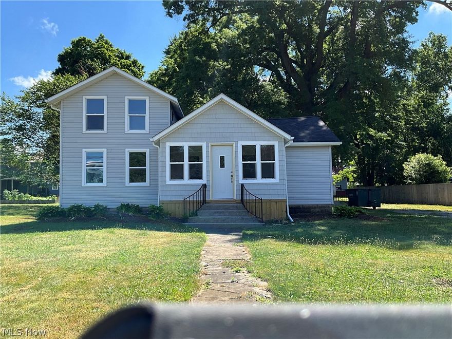Nicely redone 2 bedroom, 1 bath home in New London.  Formal dining room, new kitchen cupboards & countertop.  Brand new dishwasher & kitchen vent, fresh paint inside, new siding & windows & 5 yr old roof.  Oak hardwood floors, front & side enclosed porches.  Close to the bank, library, school & downtown.
