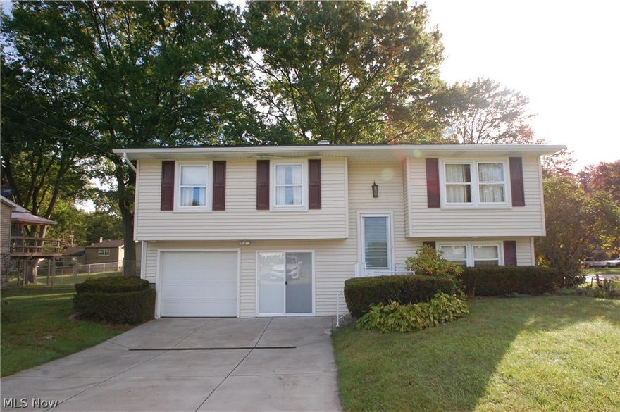 3 bedroom 1.5 bath vinyl bi-level. Features living room, Eat in kitchen with appliances, lower level family room w/ half bath and additional rec room. Tthere is a covered back porch 12 x10. The furnace is high efficiency and has central air w/newer HWT.