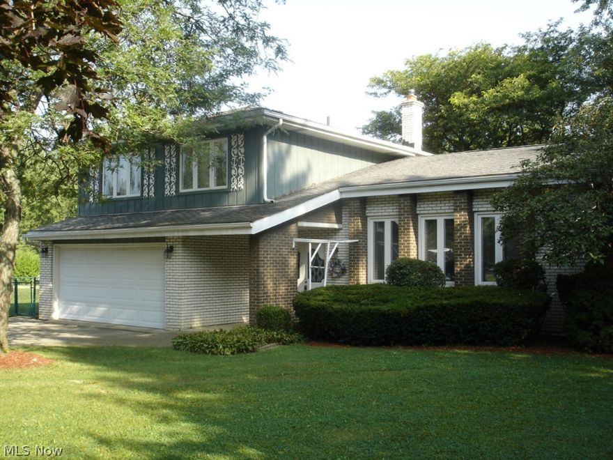 Spacious split level shows pride of ownership in every room. You will be pleasantly surprised by the care and condition of this long time family home. Dual doors welcome you into a living room enhanced by dramatic vaulted ceilings. All finished basement adds extra living space. Large room sizes will impress the most particular buyer. A park like backyard located next to an actual park. Extra two car detached garage for shop or hobbyist.