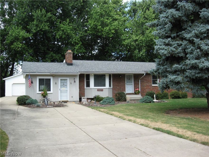 Beautiful, Well-Kept 3 Bedroom Ranch with Captivating Views of Lake Erie. Built with a real Brick Front, Vinyl Siding and a Recent Architectural Grade Roof, All on a 90' X 150" Berlin Township Lot.  There's a Large 24' X 24' Detached Garage with an 8' X 24' Covered Porch, All overlooking a Vibrant Floral Garden complete with it's own Potting Shed.  Inside....is a Great Family Room, a large Living Room with a Bay Window and a Wood Burning Fireplace, a well appointed Kitchen that flows into an Open Dining Area, a Bathroom at each end of the House, 3 Comfortable Bedrooms...and a Full Basement. Did I mention...there are the Original Hardwood Floors under the Carpet.  This Home is Country at the Lake...Quiet and Tranquil.  Call for Your Personal Showing Today!