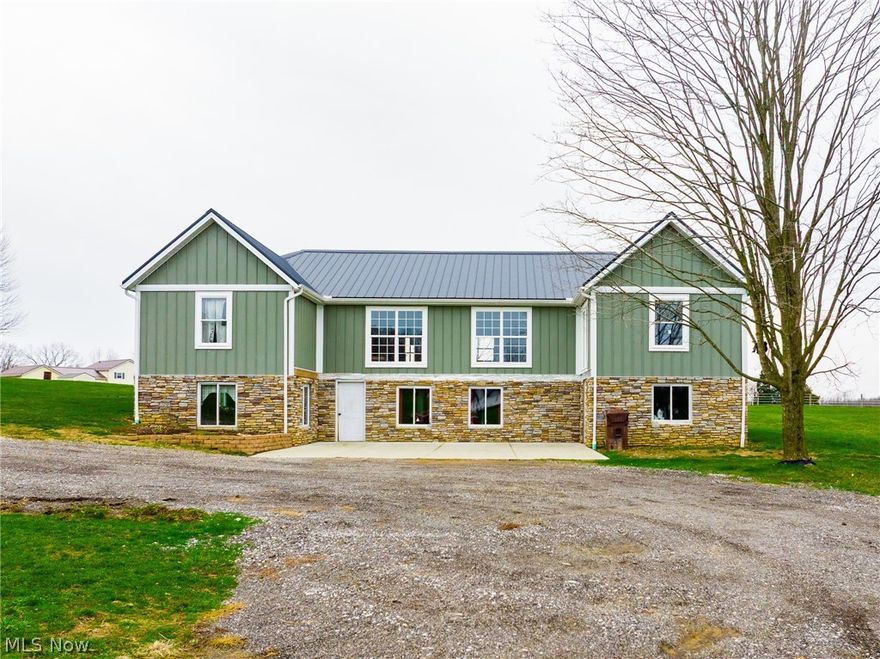 Onsite auction Monday, April 27th at 6:00 PM. Opportunity knocks on this fine offering just minutes from Fredericksburg, Holmesville and Millersburg. This property is located on a quiet country road and has a lot to offer. The block foundation basement home built in 1992 is finished out and has a nice kitchen, living room, bedroom and bathroom all on the main floor as you walk in. Upstairs you have all the options at your fingertips to complete it in any way you desire as it is mostly unfinished and ready for your plans. 1 bathroom upstairs and several bedrooms complete this 4-bedroom, 2-bathroom home. Private well and septic as well as natural gas heat and electricity in all the buildings provide convenience for the new buyers. The large 60x92 shop has natural gas and electricity and could be the home of your new business or whatever you desire. The building lot provides a nice area to build and is ready for your plans. This is a great opportunity to purchase real estate in an area where it is rarely available. Contact us with any further questions. Property will be offered separately and as a combination.