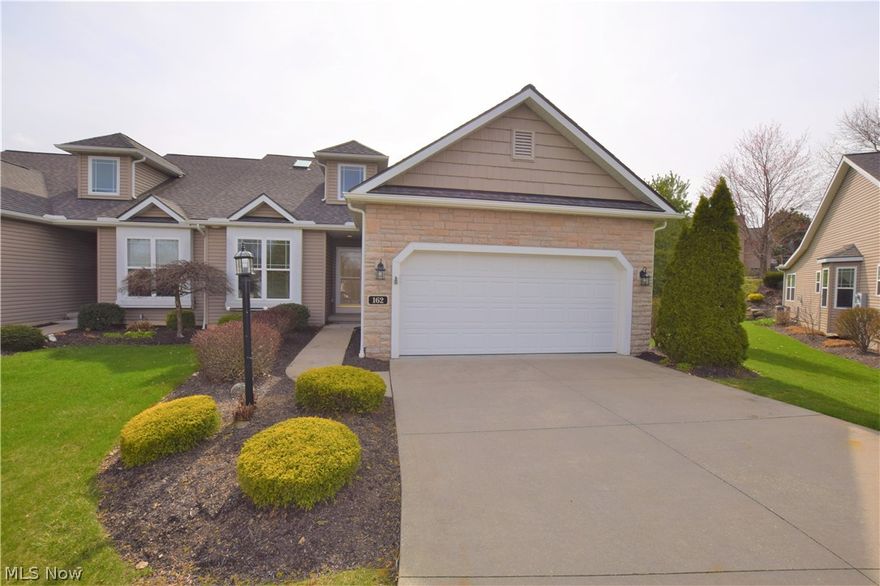 Welcome to 162 Waterford Way, a beautiful 3-bedroom, 3.5 bathroom condo in Tallmadge. This home has an open floor plan, neutral decor, and high Cathedral ceilings. The kitchen has recessed lighting, gorgeous counter tops, pretty oak cabinets, and sleek black appliances. The long breakfast bar provides abundant counter space for entertaining guests. A full bathroom is located right off the kitchen. The sky lights in the living room allow sunlight to shine into the spacious room. The corner stone fireplace is a perfect place to cozy up next to during the colder months. Directly off the living room, you'll find a bonus room -- could be used for a dining room, office, play room -- the options are endless! This room has a sliding glass door leading to the large, beautiful wooden porch; the perfect place to enjoy the outdoors. Main floor has two spacious bedrooms and two full bathrooms. Head upstairs to find the third bedroom and full bathroom. The finished basement with a half bath adds a t