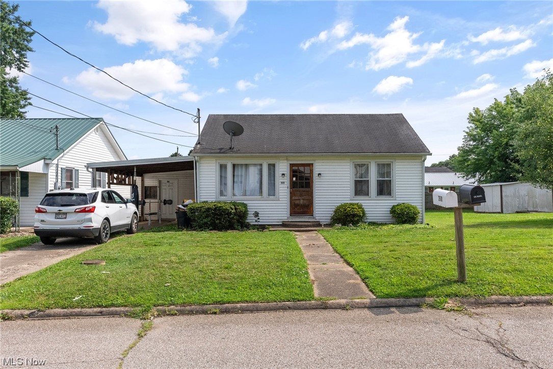 This lovely ranch home offers 3 bedrooms and 1 full bath on a double-sized lot. It has a spacious open flow from the living room, dining room and into the nice-sized kitchen. Off of the kitchen, you can walk out onto a back porch looking into your large flat backyard. This yard has enough room for all your outdoor gatherings! Plenty of driveway parking and can easily convert the space back into a garage if preferred. As for now, it is a bonus area (22X16) that screams workshop, mancave, or endless storage!