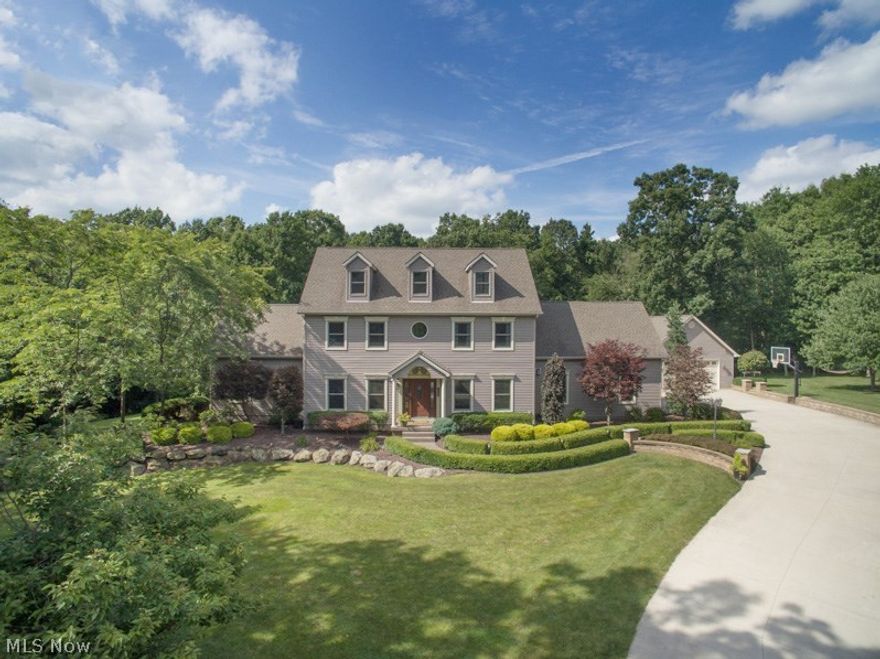 Absolutely Stunning Completely Updated Resort-Like Property that offers 5 Bedrooms/3 & 1/2 Baths, Heavenly In Ground Pool Area, Stocked Fishing/Swimming Lake, 5 Car Garage, & Huge Outbuilding, on 14 Acres of Private Land.  Home Features Include:  First Floor:  Large Living Room with Custom Copper Tiered Ceiling with Crown Molding, Awesome Updated Kitchen with Custom Cabinets, Center Island, Granite Countertops, & Stainless Steel Appliances, Formal Dining Room with Multi Level Ceiling with Crown Molding & Decorate Tin Ceiling Tiles, First Floor Office/Library with Fireplace, Large First Floor Laundry Room, & 1/2 Bath.  Second Floor:  Huge Master Suite with Master Bonus Room, 4 Walk In Closets, & Glorious Master Bath with Jacuzzi Soaking Tub, Custom Granite Shower, & Double Vanity Sinks, 2 other Large Bedrooms, & 2nd Full Bath.  Third Floor:  2 Huge Bedrooms & 3rd Full Bath.  Lower Level Offers an Awesome Rec. Room/Game Room Area with 50" Wall Plasma TV, Family Room Area 65" Wall Plasma