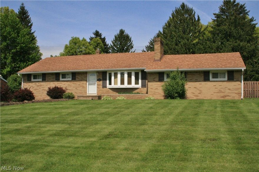 Welcome to your new home! This all brick ranch is in pristine condition, with all appliances staying including washer & dryer, all that's left is moving in your furniture. Fully fenced in private backyard. Finished space in the basement adds almost 700 square feet of living space, with a dry bar and plenty of storage. Kitchen appliances new in 2015, and a new garbage disposal 2017. Hardwood underneath carpet on first floor. Radon mitigation system, newer hot water tank, and a one year home warranty offered with this fantastic home. Mineral rights transfer with home. Don't miss out on this gem!