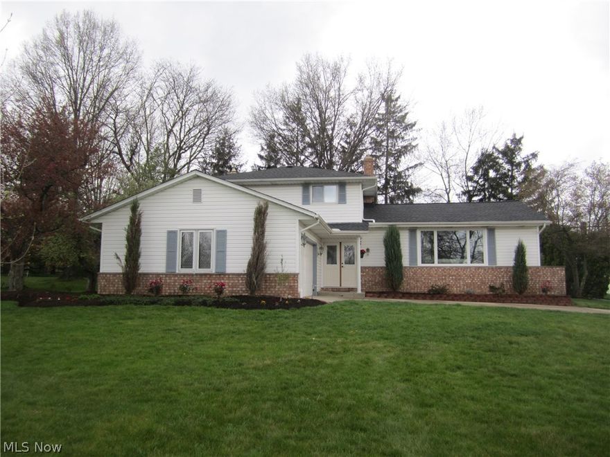 OPEN Sunday 4/24/16 from 1-4 p.m. Beautiful updated home located in sought after north Solon's "Cannon Estates".The home is situated  on a professionally landscaped lot with private patio, outdoor speakers, fire pit & gas grill.  This lovely home was updated from top to bottom & freshly painted throughout in the latest Restoration Hardware color palate. Spacious open floor plan includes remodeled kitchen with maple cabinets & the stainless steel appliances are included in the eat-in-kitchen. As you enter the foyer you're welcomed by the gleaming hardwood floors in the vaulted great room & dining room. The first floor family room offers a wood burning fireplace with gas logs framed by custom built-in cabinets. The second level boasts three large bedrooms a remodeled bath w/whirlpool tub, separate shower & heated ceramic floors. Enjoy entertaining in the recently completed recreational room, w/new Fraisse carpeting, wet bar, full bath & large utility room. Additional updates include newe