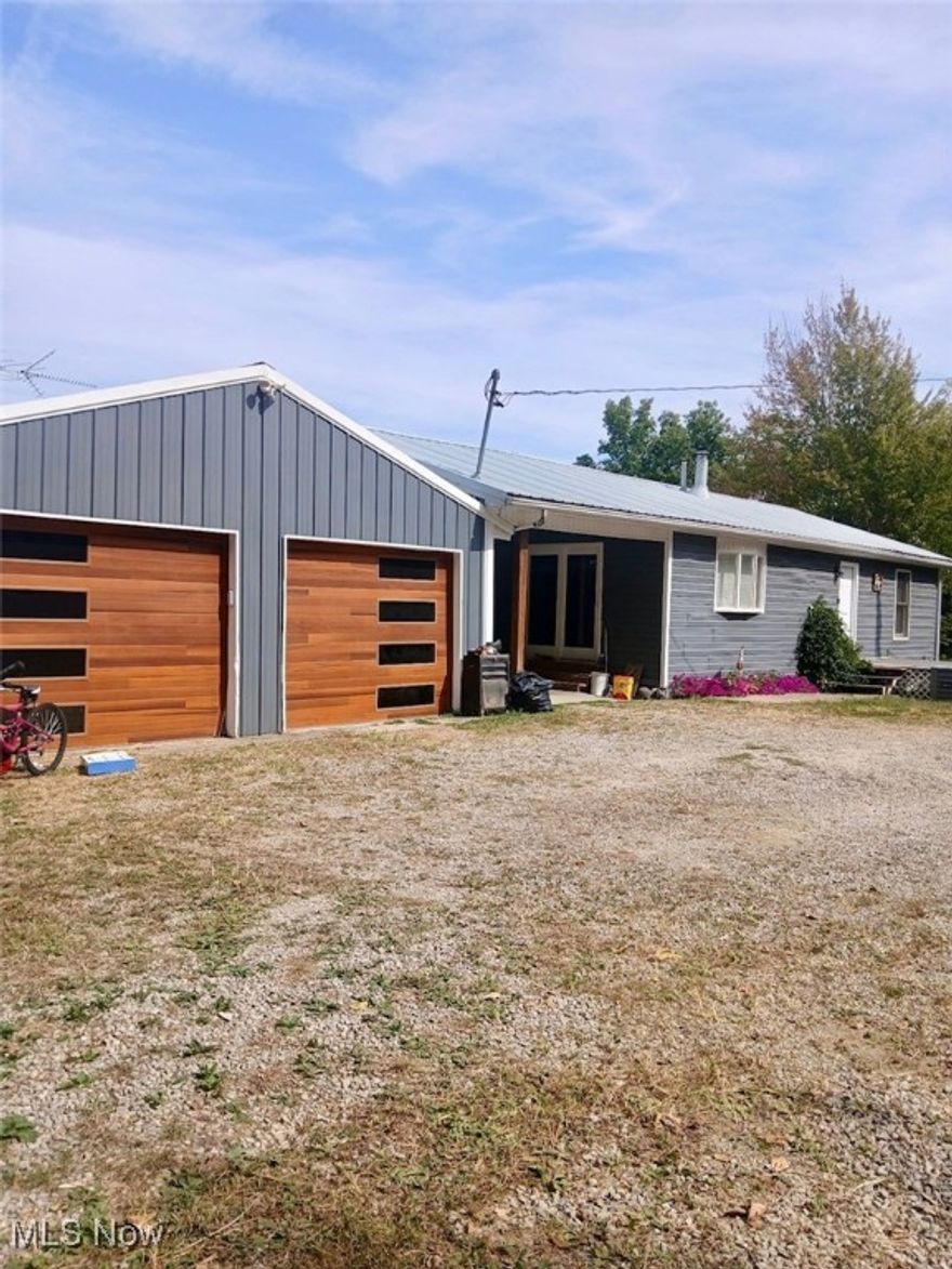4 bedroom 2 bath house offers modem comfort in a country setting on approx 12 acres m/l.  Lots of room to breath and reflect in a private setting all remodeled in the last year.  Features new furnace, new plumbing, new electric, new electric panel all providing peace of mind for years to come.  

The interior showcases a brand new kitchen with updated appliances, completely renovated bathrooms, new flooring and fresh paint.  Every detail has been thoughtfully updated to created a clean and contemporary feel.  Full walkout basement with panoramic views.  
New metal roof.  Gorgeous wood grain garage doors with side windows to add  charm and a contemporary feel in a country setting.