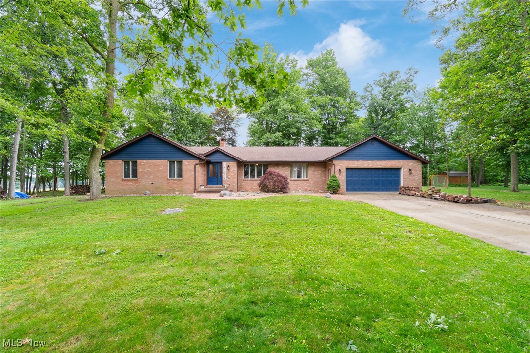 Tucked away on a quiet private road, this beautifully updated brick ranch offers the perfect blend of privacy and convenience. Sitting on 1.55 wooded acres, this spacious 2,400 sq ft home provides serene views and plenty of room to roam, while still being right in town with all the amenities.
Step inside to find many updates throughout, including newer flooring in most rooms, a new roof, and a beautiful kitchen featuring a newer refrigerator, dishwasher, and cooktop. With ample natural light and a warm, welcoming layout, this home is perfect for relaxing or entertaining.
Outside, you'll love the peaceful, wooded surroundings and the large pole building—ideal for storage, a workshop, or hobbies. Don’t miss this rare combination of peaceful country living with in-town convenience—schedule your private tour today!