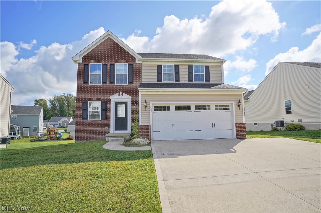 Welcome to this gorgeous, bright three bedroom, two and half bath brick front colonial home in Cranberry Creek. Come on into this beautiful open floor plan. All open living room, kitchen and dining room which has a sunroom where you can sit and enjoy the natural light to shine through and a window door leading down to the back patio. The kitchen has abundant of cabinets, pantry, refrigerator, stove, dishwasher, and built-in microwave. There is a half bath and mudroom to finish the first floor. WOW! Upstairs you will find three bedrooms, a full bathroom and laundry room with built in shelves. The master suite has a walk-in closet and a bright full bathroom. The clean basement is unfinished, has new bathroom structure to be finished, plenty of space for storage, work out equipment, etc. Large backyard is ready for you to entertain, where you can cook out or just relax sitting outside. There is a two-car attached garage. All you have to do is move in! This fabulous home is in Brimfield To