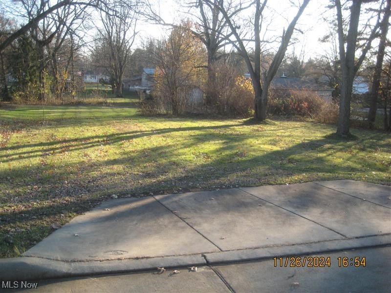 Vacant lot with 2 parcels. Some mature trees on the lot. Mogadore Local Schools. This property is eligible under Freddie Mac First Look Initiative through 5/30/2025. The property is sold in AS-IS Condition. Buyer to verify all information. Buyer or Buyer's Agent responsible to check with Building, Zoning, EPA, DEA, Tax Department or any other requirement for intended use. Buyer to pay for all inspections. Earnest money to be a cashier's check. Subject to clear title.