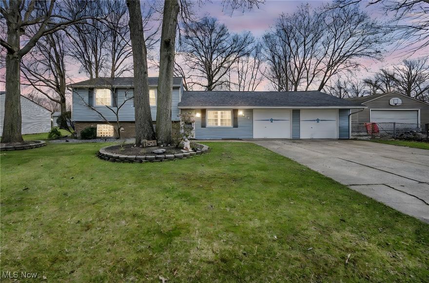 Feel right at home in this beautiful and well maintained 5 bedroom Split level in Lorain.  Many updates abound, newer windows, newer roof, newer flooring, and updated kitchen.  As you enter a spacious living room awaits and directly into the kitchen and dining room on the main level.  A full bathroom / laundry room along with two bedrooms round out the lower level.  Three gorgeous bedrooms and a full bathroom greet you on the upper level of this wonderful
home.  Outdoor covered hot tub stays with the home.  There is a 3 1/2 car attached garage with separate door on the rear of the property.   As well as a large shed provides extra storage for tools, lawn equipment, or outdoor toys.  Schedule your showing today