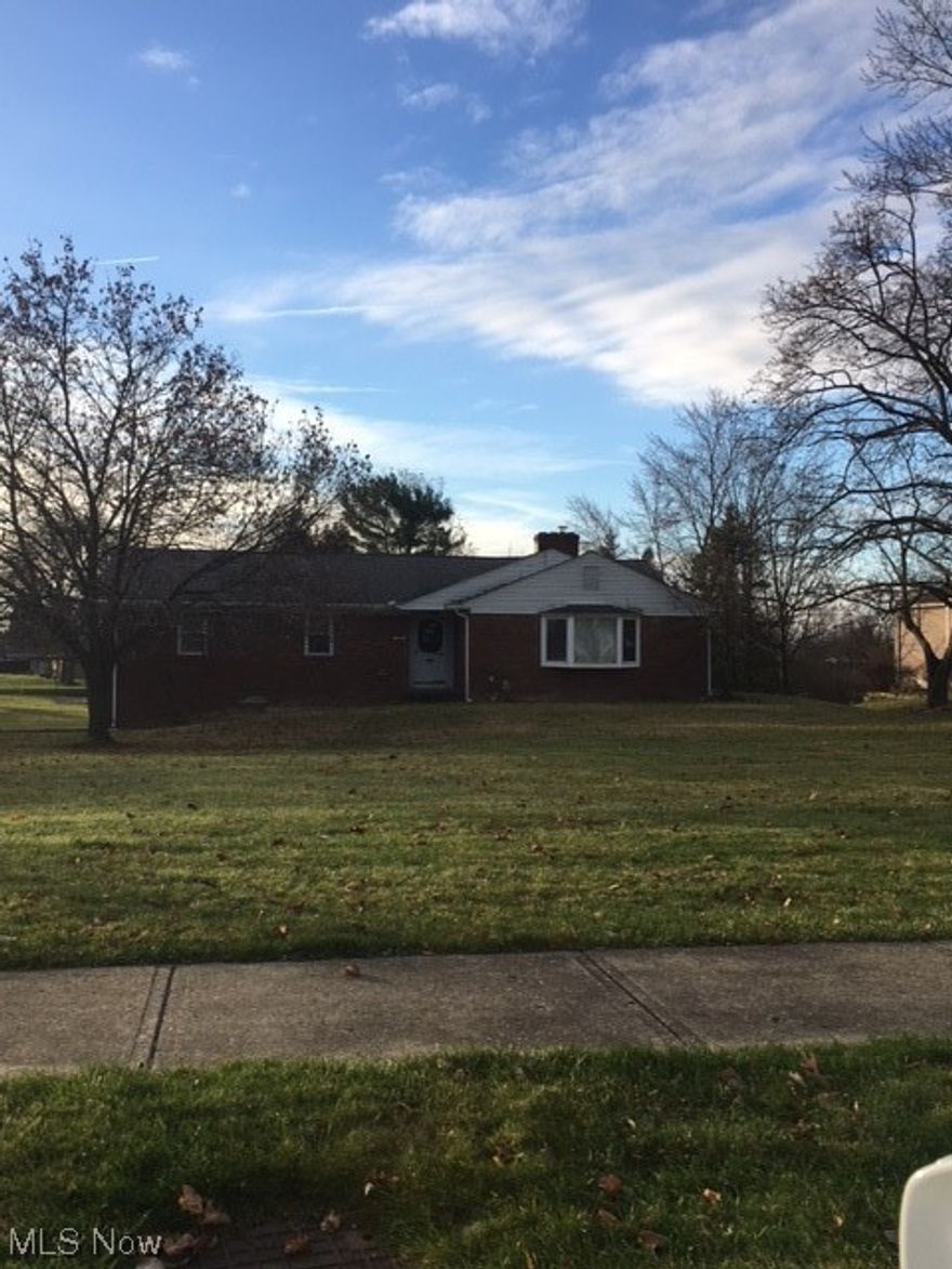 This all brick ranch style home sits on just over an acre of land and is all cleaned up and ready for someone to take it from here.  So many options make this a great choice for your next project, or your next home.  Plenty of space with an eat in kitchen as well as a formal dining room, generously sized bedrooms and 1.5 baths make this an ideal home for everyone.  If it's land you're looking for but don't want to leave the suburbs, this could be just the right spot, as well.