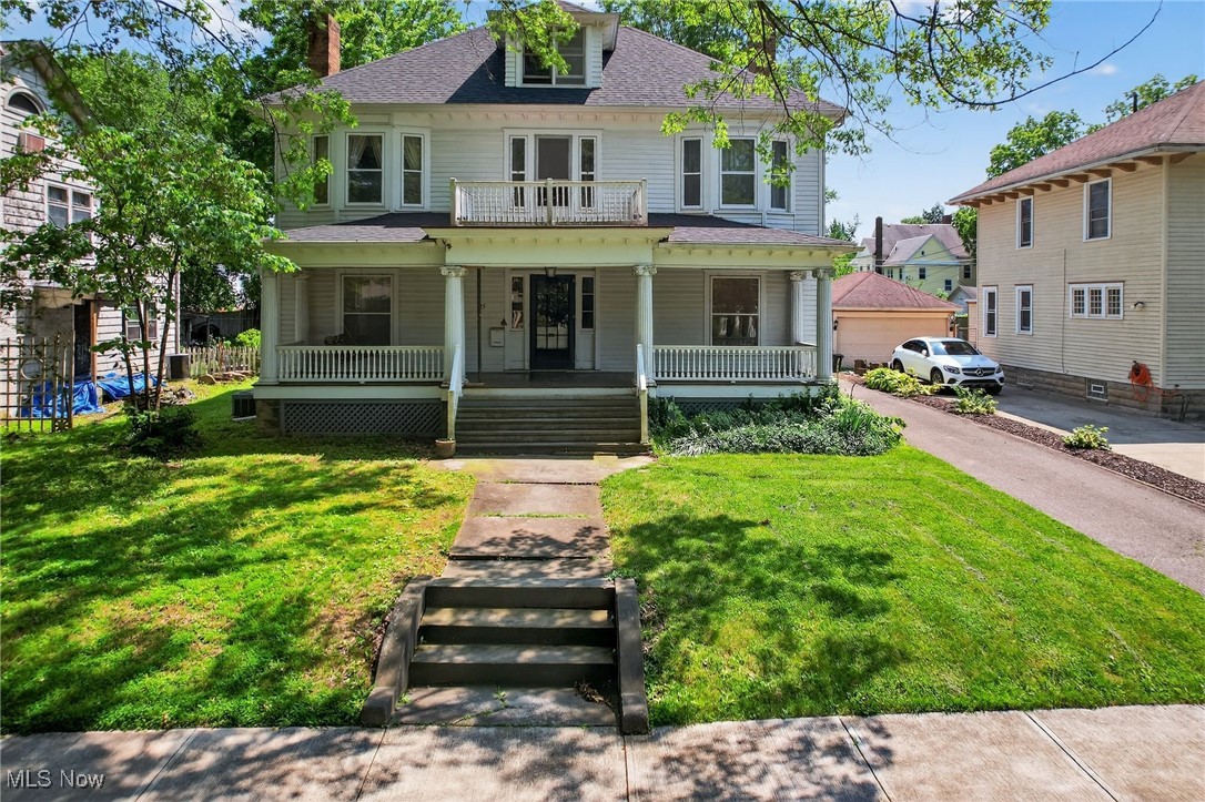This home has the absolute "wow" factor! Located in Elyria's highly sought after Washington / Overlook neighborhood, you will not be disappointed when you step inside this beautiful three story center hall colonial. In the living room you'll find ample space on the bookshelves, several windows to let in the natural light, and a fireplace. You can reach the enclosed addition from the living room which contains a great view of the backyard with windows all along the south wall and true, well maintained woodstove. Need a lot of cabinet space? You've got it here with an ample number of cabinets and cupboards. Round it out with two door wall oven, cooktop, microwave, dishwasher, and stainless steel refrigerator. Did we forget to mention there is still plenty of room for eating in rather than using the 15x13 dining room? On the second floor, you'll find three full bedrooms, an office, a full bathroom, and another huge additional 17x13 space to use to your heart's content. Full of windows, this is one of the lightest rooms in the house. Lastly, the third floor is HUGE and complete w/ skylights and a full walk-in closet with built in storage shelves.