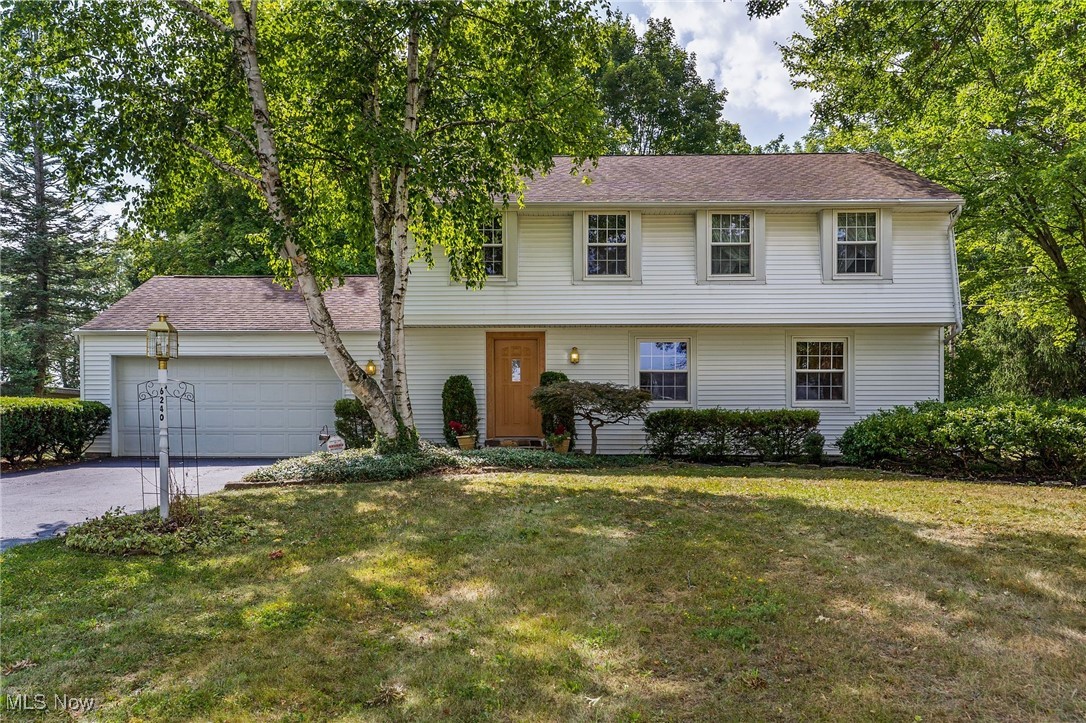 Welcome to this beautifully maintained 4-bedroom, 2.5-bath home in one of Canfield’s most desirable neighborhoods, offering over 2,000 sq ft of comfortable living space on a spacious 0.65-acre lot. Step inside to a warm and inviting layout featuring a bright living room, a formal dining area, and a cozy family room with a fireplace that’s perfect for gatherings. The kitchen is thoughtfully designed with plenty of cabinetry, countertop space, and a breakfast area overlooking the backyard. Upstairs, you’ll find a generously sized primary suite with its own private bath, along with three additional bedrooms and another full bath. The full basement offers excellent storage and potential for finishing to suit your needs. Outside, enjoy a large, beautifully landscaped backyard ideal for entertaining, gardening, or simply relaxing in your own private retreat. Additional highlights include an attached 2-car garage, central air, and a location that’s just minutes from schools, parks, dining, and shopping, with quick access to major routes. This move-in ready home blends comfort, space, and a sought-after location—schedule your private showing today and see why this Canfield gem won’t last long!