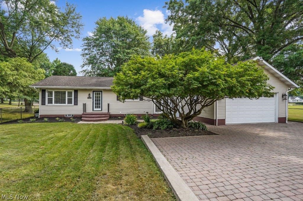 You will surely fall in love once you enter this spectacular home! On the main level you will find a spacious foyer leading into a space that would be ideal for a play area or home office. Conveniently located off that area is a spacious great room with corner fireplace.
The new kitchen is awaiting its first family gathering! The large eat in kitchen leads into a dining room which could also double as a family room. Both baths have been completely remodeled. Outside you will enjoy Davenport as your neighbor. You will enjoy the green space all around this beautiful home! The deck once held a hot tub and could potentially again if so desired. The patio is a fantastic space for outdoor entertaining. Call your favorite real estate professional today and schedule your private showing!