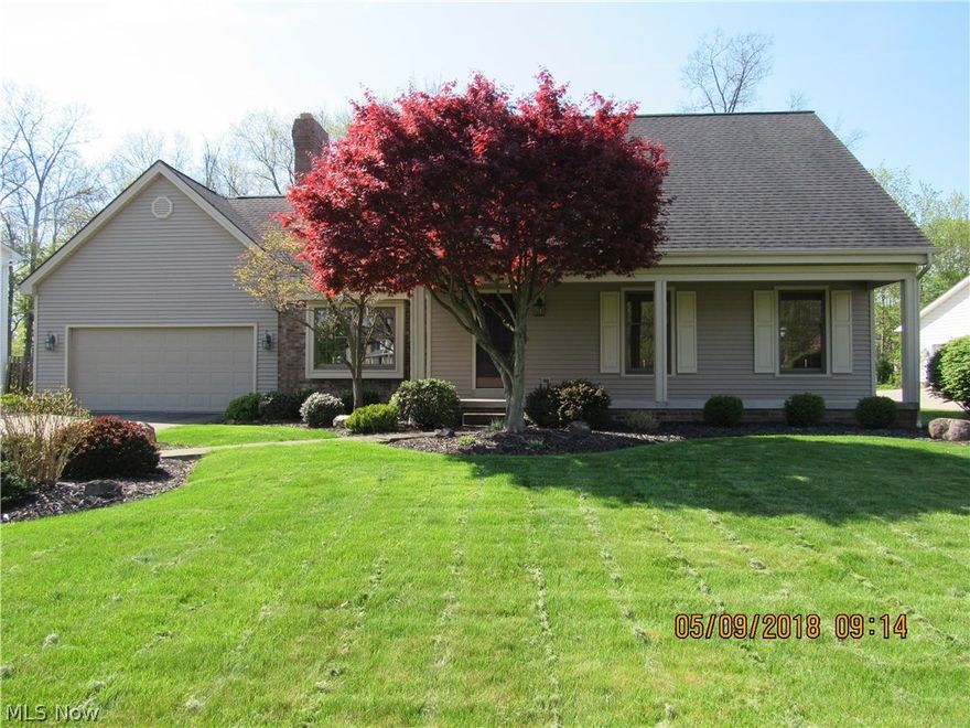 Enter this Vinyl sided 2 Story thru a large inviting foyer to your new home with  Formal Living Room and Dining Room, Kitchen with center island, built in gas range top, built in microwave and oven. Refrigerator included.  Large family room with wood burning brick Fireplace that has front view access. Upper level with large master bedroom w/3 closets and master bath with skylight for natural light. 2 additional bedrooms and main bath. First floor laundry area and half bath. Full unfinished basement w/sump pump, could be finished for additional living space.   Sit on the brick rear patio overlooking the private partially wooded rear yard and enjoy the quiet peaceful summer evenings. Covered front porch. This home offers so much and must be seen to appreciate.