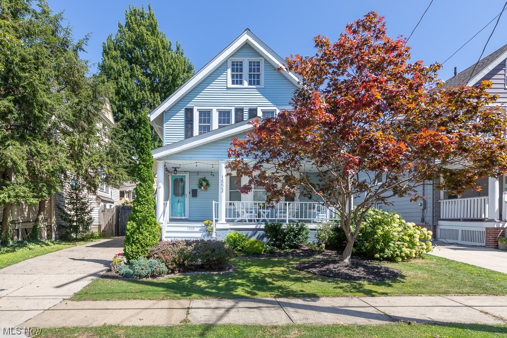 Move right into this well taken care of & tastefully updated 4 bedroom 1 1/2 bath colonial located in the heart of Lakewood. As you enter into this home you will see classic craftmanship such as hardwood floors, wood trim, leaded glass cabinets, formal dining room & high ceilings mixed with modern features of today. The renovated kitchen is a chef’s dream complete with quality soft close drawers & glass doors, cabinet lighting, pull out trash can, vented range hood, farmhouse sink, tile backsplash, quartz counters & stainless appliances. Head upstairs to 4 bedrooms & updated main bathroom featuring new fixtures, vanity & flooring. The lower level is partially finished with rec room featuring wall mounted electric fireplace & 1/2 bath. Sit & relax on the deck or the rear brick patio within the fully privacy fenced yard or watch the neighborhood activity from the lighted front porch. Additional features & updates include: complete tear-off roof with Certainteed Landmark shingle August 2023, quality vinyl windows, vinyl siding, high efficiency Carrier furnace & AC 2011, 50 gallon H2O tank 2007, updated breaker panel, Basement Systems waterproofing 2001, extra basement refrigerator, 3rd floor walk-up attic. 2 car garage & garage roof 2009. All Appliances & 12-Month Home Warranty Included! ** MULTIPLE OFFERS HIGHEST & BEST OFFER TO BE SUBMITTED BY 9PM THURSDAY SEPTEMBER 7TH **