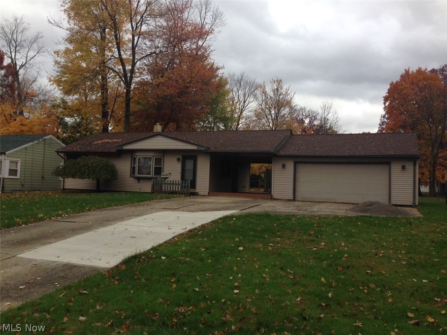 Great home is much larger than you would realize with the finished basement! A third bed and a second full bath along with a great sized family room really give so much extra room for expanding! Vinyl Sided home with vinyl tilt windows. Central Air. Updated roof on the main house. Basement waterproofed, too! The first level of this great ranch offers spacious living room, two nice sized bedrooms, a nicely remodeled full bath with ceramic tiled floors and surround in the shower! The kitchen has remodeled cabinets, nice counter space stove and Dw stays, and a roomy dinette with glass sliders leading to a big wood deck. The spacious backyard is larger than you would ever think boasting almost a half acre and its fenced for you! The breezeway from the huge 2 plus car garage to the house has beautiful floor and gives you cover as you bring your groceries inside! I can't wait for you til see this home! You may need to paint a few rooms to make it your own, but who wouldn't? Don't miss this h