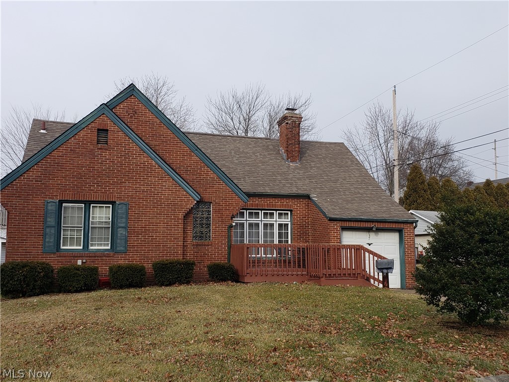 This all brick bungalow overflows with living space. As you enter you will find hardwood floors throughout. The living room features fireplace and picture window, dining room with french doors open to 3 season sunroom that looks out to a huge back yard. Across the street (back of home) you also have a huge 3 car detached garage, a mechanics, boaters, motorcycle, RV, crafters dream. The potentials are endless. Back inside, the basement has partially finished living space, with bar area. Upstairs features bedroom, adjoining to another room, and a huge closet. This home has much potential.