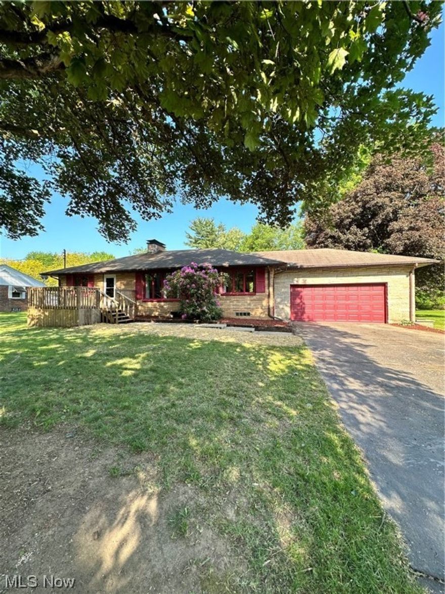 Welcome to this beautiful, well-kept brick ranch that sits on 1+ acre of land on a private street in Rock Creek. As you enter through the newly updated front door you are welcomed by the spacious living room with large windows allowing in ample amount of natural light. On the main level you will also find a newly updated kitchen with all appliances and attached dining room as well as a full bath and 3 spacious bedrooms. This home offers a full, walk-out basement with the potential to finish adding additional space! There is endless possibilities- Don't miss the opportunity to own this GREAT house!